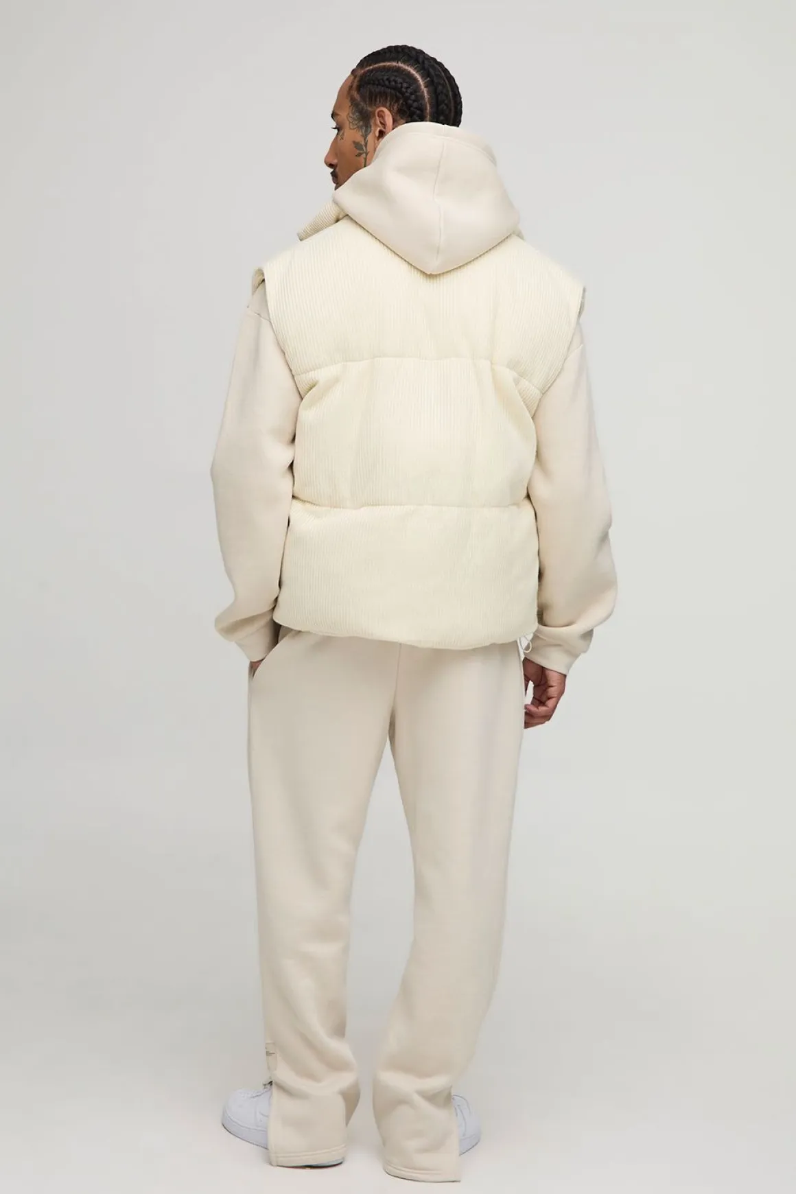 Gilet puffer tricoté à col entonnoir, coupe boxy