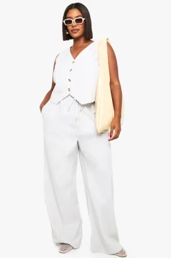 GILET À RAYURES PLUS ET PANTALON À JAMBE LARGES COORDONNÉ