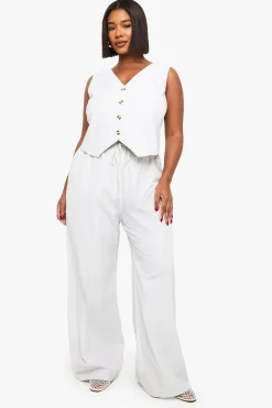 GILET À RAYURES PLUS ET PANTALON À JAMBE LARGES COORDONNÉ