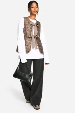 Gilet rembourré orné d'un nœud