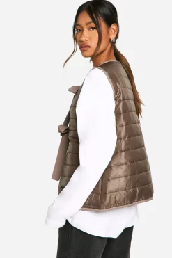 Gilet rembourré orné d'un nœud