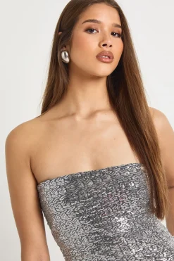 Haut bandeau à sequins asymétrique à ourlet