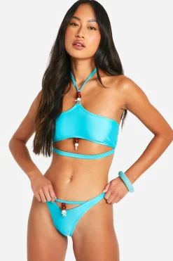 Haut de bikini à encolure halter orné de coquillages perlés
