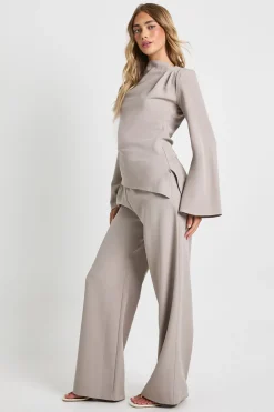 Haut drapé asymétrique & pantalon à jambes larges coordonné