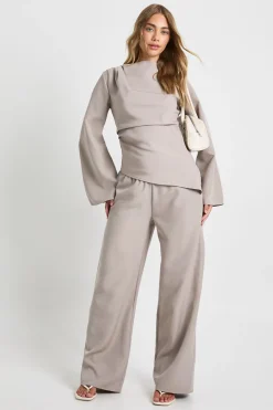 Haut drapé asymétrique & pantalon à jambes larges coordonné