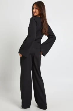 Haut drapé asymétrique & pantalon à jambe large coordonné