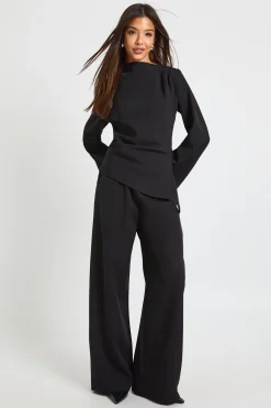 Haut drapé asymétrique & pantalon à jambe large coordonné