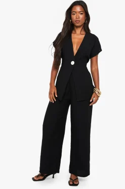 Haut à détails de boutons style lin et pantalon coordonné à jambes larges