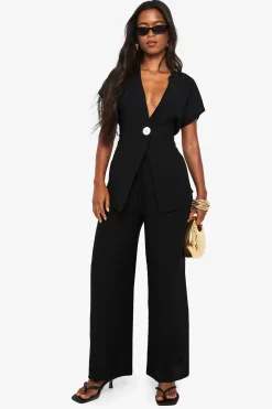 Haut à détails de boutons style lin et pantalon coordonné à jambes larges