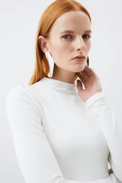 Haut en coton extensible à col entonnoir