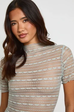 Haut En Dentelle Texturée Transparente À Col Montant Intégré