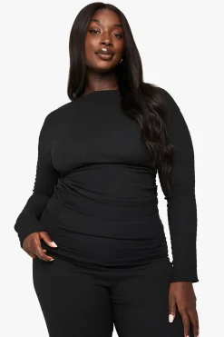 Haut grande taille asymétrique à effet froissé et manches longues