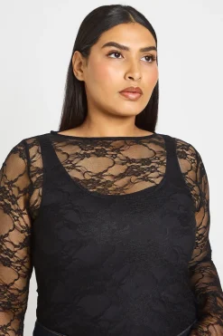 Haut Grande Taille En Dentelle Transparente À Poignets Évasés