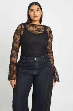 Haut Grande Taille En Dentelle Transparente À Poignets Évasés
