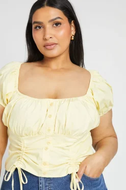 Haut Grande Taille À Manches Bouffantes Et Boutonnage Devant