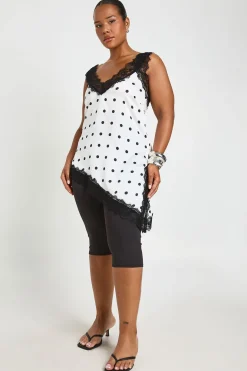 Haut Grande Taille À Ourlet Asymétrique En Satin À Pois Avec Dentelle