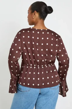 Haut Grande Taille Péplum Satiné À Pois Avec Nœud Devant