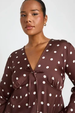 Haut Grande Taille Péplum Satiné À Pois Avec Nœud Devant