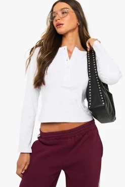 Haut Henley en coton à boutons sur le devant et manches longues