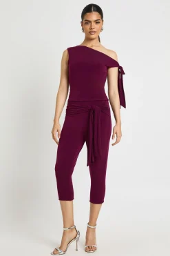 Haut à Épaule Asymétrique avec Détail Nœud en Tissu Slinky Double Couche