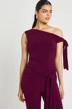 Haut à Épaule Asymétrique avec Détail Nœud en Tissu Slinky Double Couche