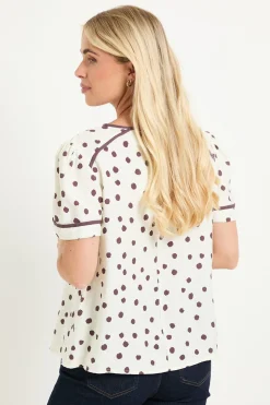 Haut Petite À Manches Courtes À Pois Avec Détails Contrastés