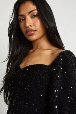 Haut à sequins à encolure en cœur