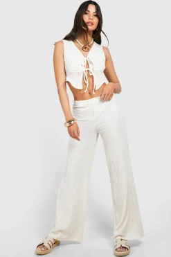 Haut texturé à nouer à l'avant et pantalon à jambes larges