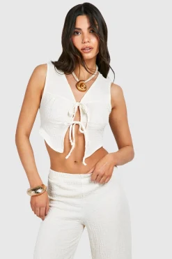 Haut texturé à nouer à l'avant et pantalon à jambes larges