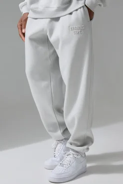 Homme Active Training Dept Jogger embossé surdimensionné