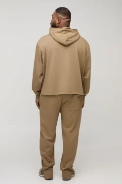Hoodie à poche passepoilée brodée Plus Tonal