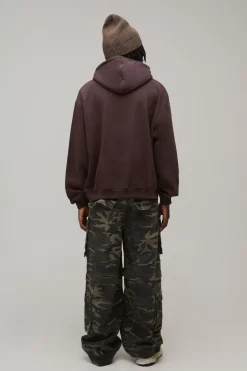 Hoodie surdimensionné à coupe boxy, fini spray wash et appliqué en forme d'étoile