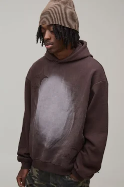 Hoodie surdimensionné à coupe boxy, fini spray wash et appliqué en forme d'étoile