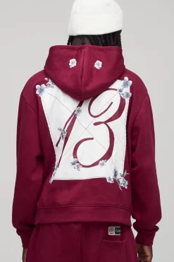 Hoodie surdimensionné, à coupe carrée, orné de broderies florales