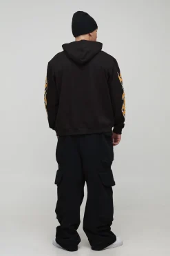 Hoodie surdimensionné noir à motif flammes et dés