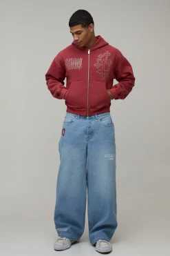 boohooMAN Jean Ample Teinté À Imprimé Graphique Attention Intégral<Homme Denim|Denim