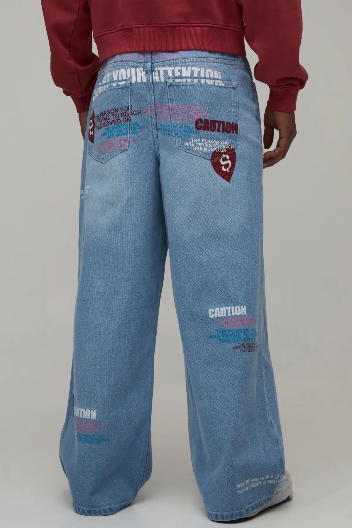 boohooMAN Jean Ample Teinté À Imprimé Graphique Attention Intégral<Homme Denim|Denim