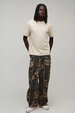 boohooMAN Jean Baggy Rigide À Bords Effilochés<Homme Denim|Denim