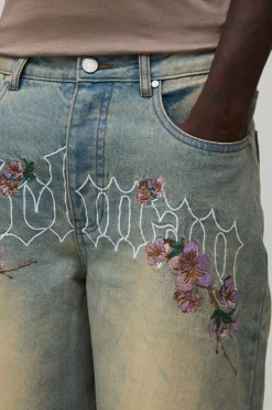 Jean Coupe Ample Broderie Florale À L'entrejambe