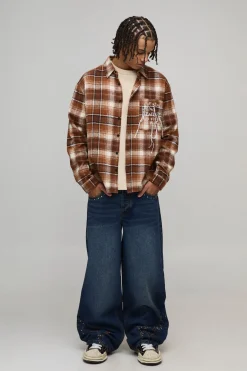 Jean Coupe Baggy avec Broderie Western Cloutée à l'Ourlet