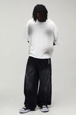 Jean Coupe Baggy Motif Laser Éclair