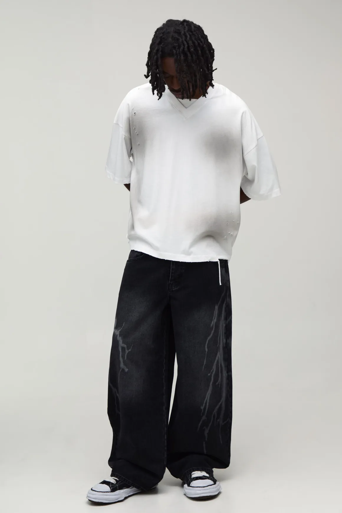 Jean Coupe Baggy Motif Laser Éclair