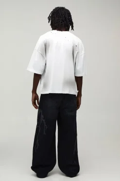 Jean Coupe Baggy Motif Laser Éclair