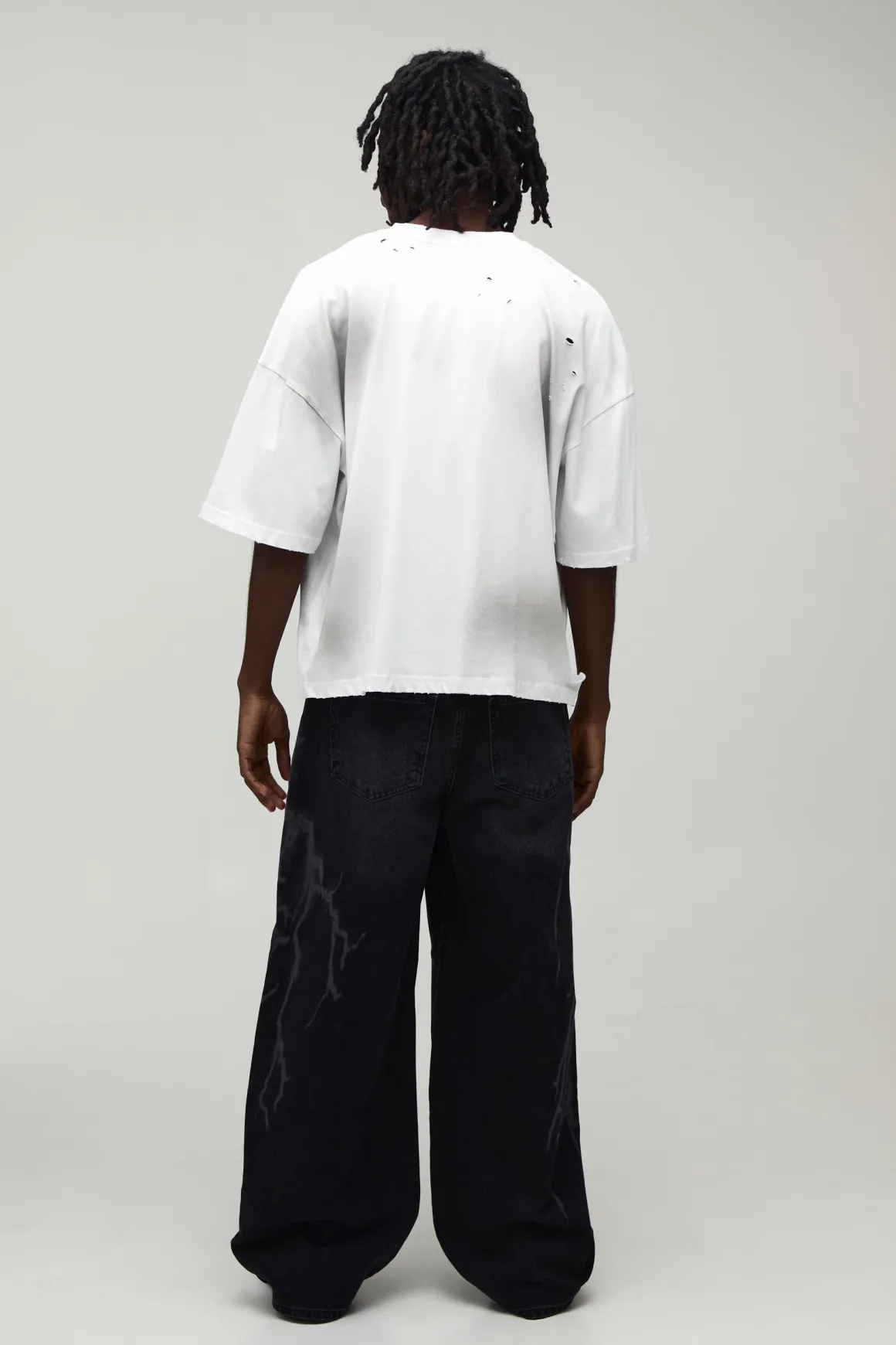 Jean Coupe Baggy Motif Laser Éclair