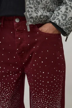 Jean denim à coupe décontractée surteinté et orné de strass