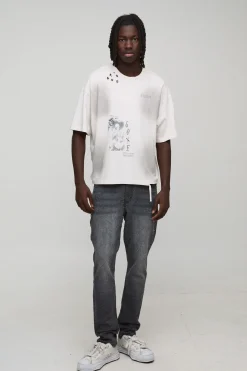 Jean denim slim évasé orné de strass clairs