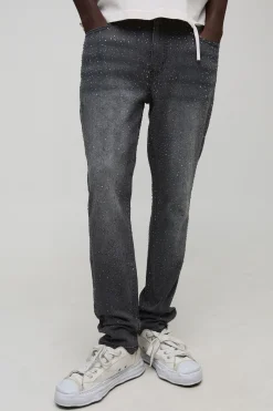 Jean denim slim évasé orné de strass clairs