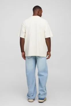 boohooMAN Jean en denim décontracté à broderie florale avec ourlet tombé<Homme Denim|Denim