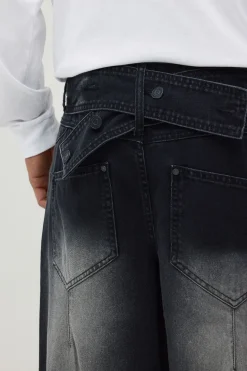 Jean En Denim Rigide Délavé Coupe Baggy