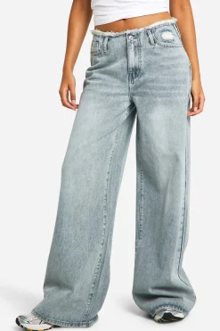Jean grande taille à ceinture brute et jambes larges